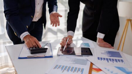 Business people analyzing financial data