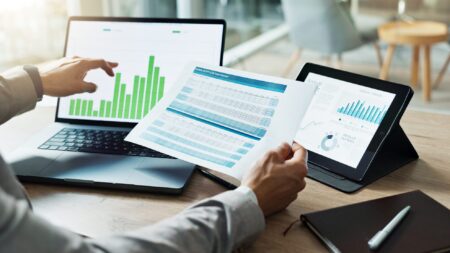 Businessman analyzing stocks