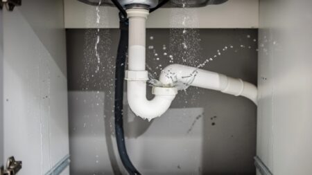 Damaged leaking sink pipe