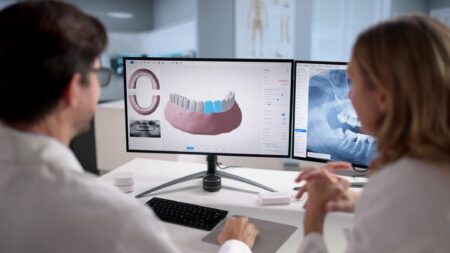 Dentists examining dental x-rays