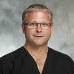 Dr. Thomas Shuster