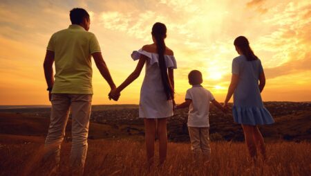 Family watching sunset