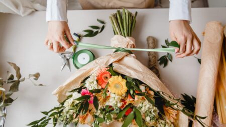 Florist with bouquet flower shop
