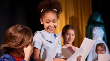 Girls rehearsing school play