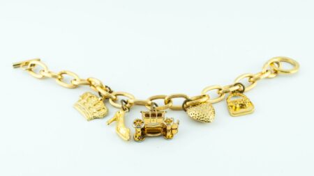 Golden necklace with charm jewelry