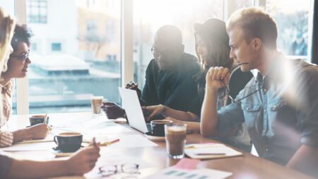 Group of employees in meeting room