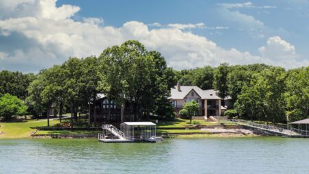 Luxury houses on lake in summer