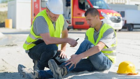Male construction worker slip and fall injury