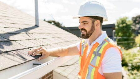 Man inspecting roof