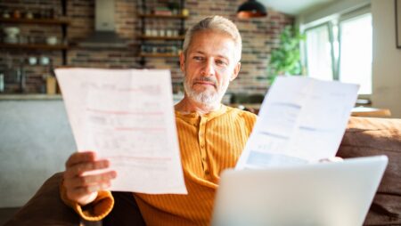 Man reviewing documents RRSP TFSA