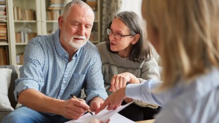 Man signing power of attorney contract