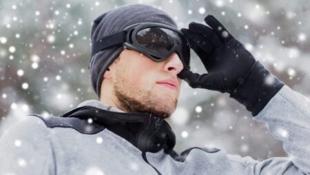 Man with ski goggles winter eye safety