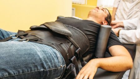 Non-surgical spinal decompression