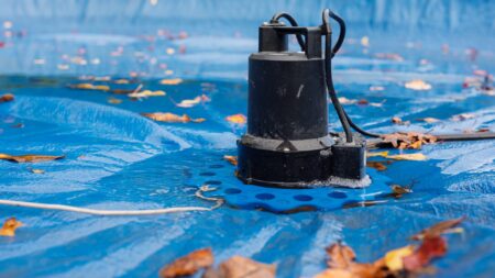 Pool cover pump winterizing in fall
