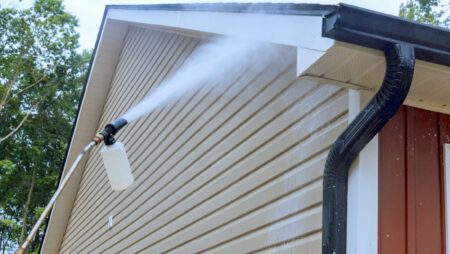 Power washing home exterior