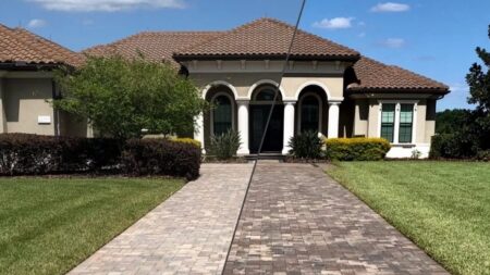 Adam Jeter's Window Washing & More Inc. before and after driveway