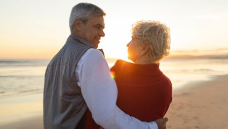 Senior couple on beach sunset