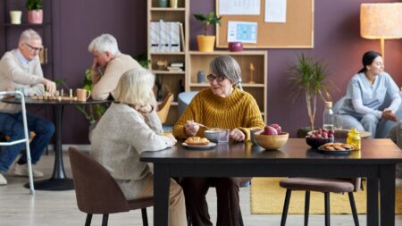 Seniors conversing retirement home