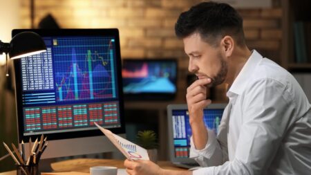 Stock broker analyzing market data