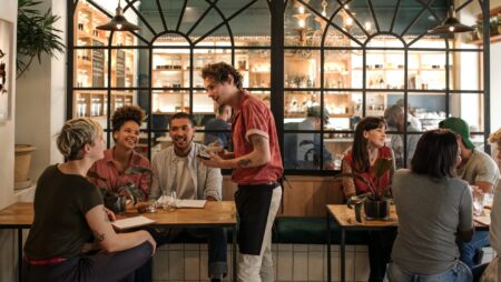 Waiter taking order restaurant