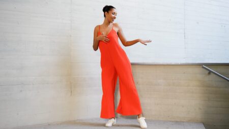 Woman dancing by stairs