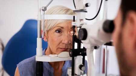 Woman getting eye exam