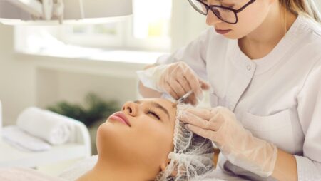 Woman receiving dermal aesthetic treatment sculptra