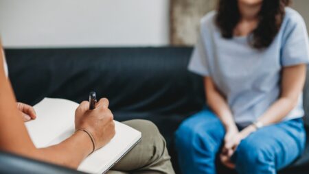 Psychotherapy session, woman talking to his psychologist in the