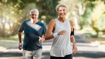 Retirement, couple and running fitness health for body and heart wellness with natural ageing. Married, mature and senior people enjoy nature run together for cardiovascular vitality workout.