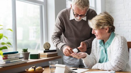 Adult seniors taking medicine Medicare