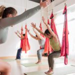 Embrace Serenity: The Transformative Benefits of Aerial Yoga and Trapeze Yoga