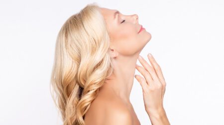 Blonde woman with rejuvenated glowing skin