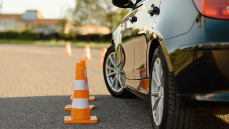 Car and traffic cones driving school road test