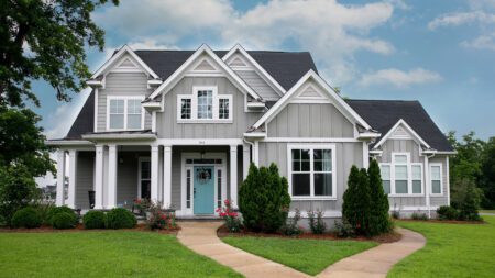 Craftsman cottage house with blue door