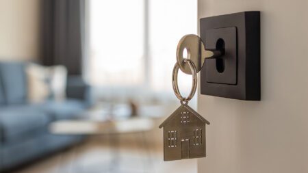 House key in lock open door