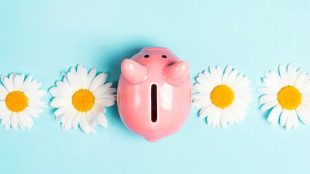 Piggy bank with flowers spring financial reset