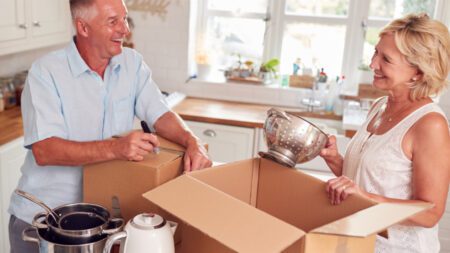 Senior couple cleaning house downsizing Matthew De Fede | Realty Executives Elite Homes