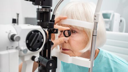 Senior woman getting eye exam