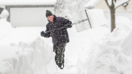 Shoveling snow driveway