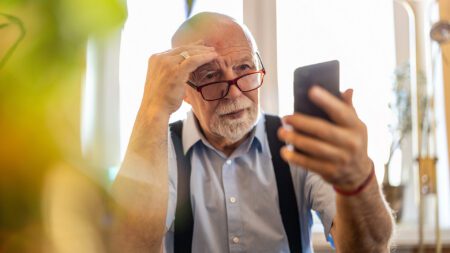 edlerly man on phone technology