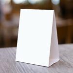 The Silent Salesperson: Why Your Table Tents Need Photos, Not Paragraphs