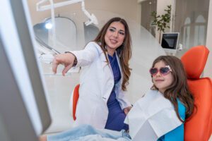 Dentist with child-Airily Orthodontics-Moorestown Living