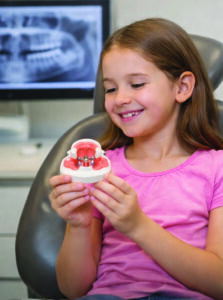 Girl at dentist Just Orthodontics