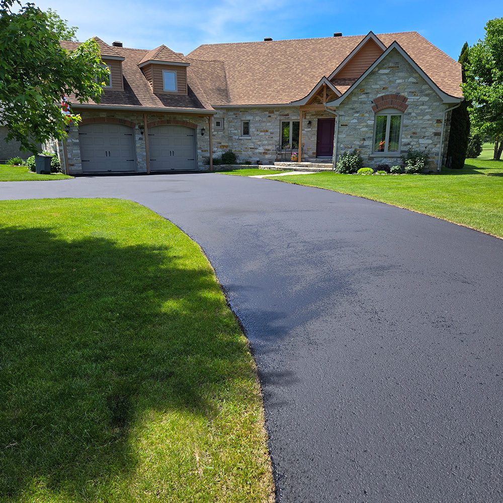 Newly sealcoated driveway Ideal Asphalt