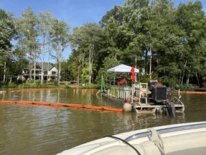 Siltbusters Dredging Service, LLC dock woods nature job site