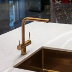 How Brass, Copper and Gold Finishes Are Adding Richness Back Into the Home