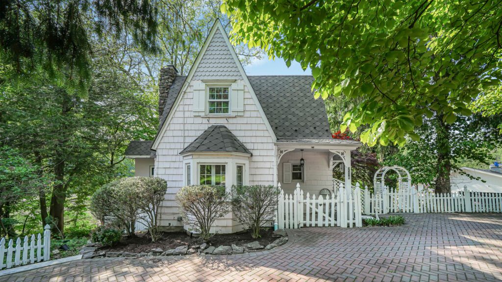Small white house Matthew De Fede Realty Executives elite homes