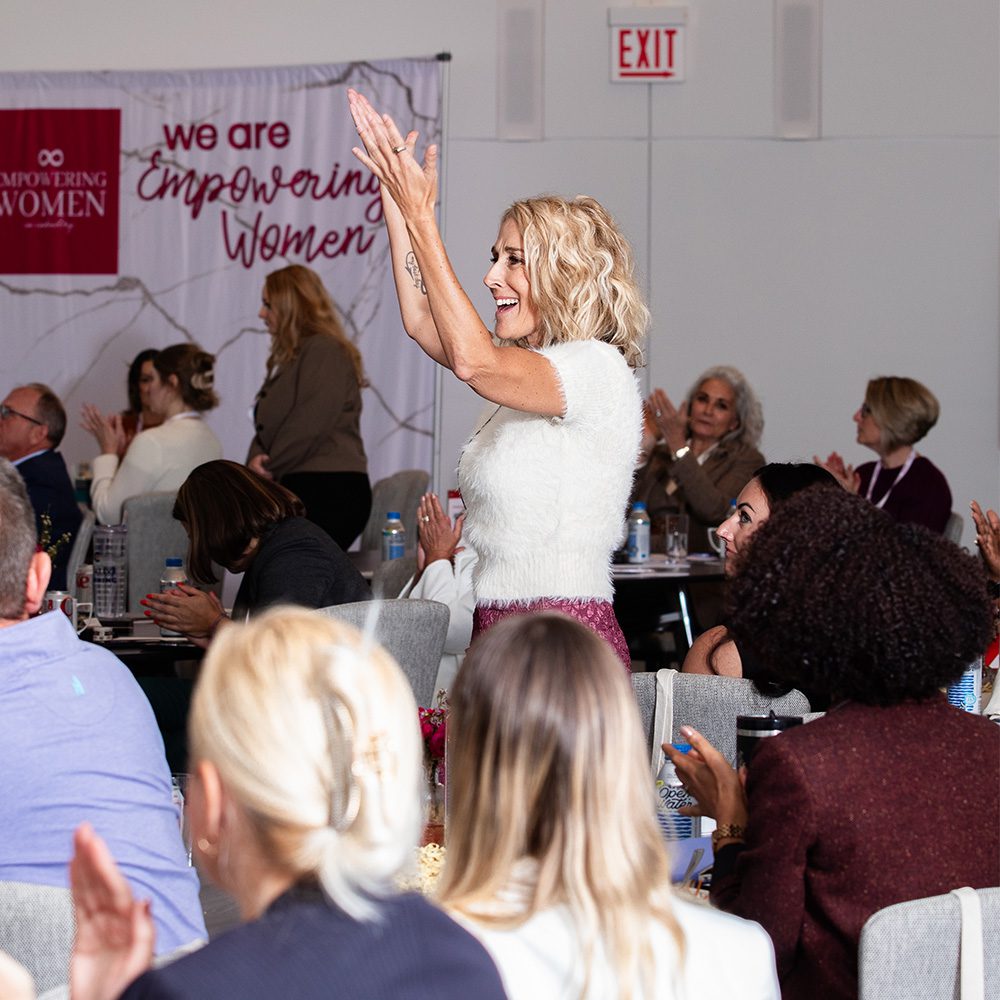 Women clapping at Empowering Women Carolinas Event - Empowering Women in Industry