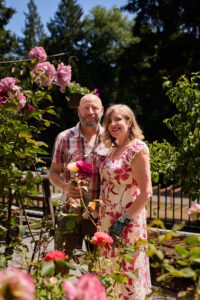 Evola Builds, LLC Amber and Michael with flowers