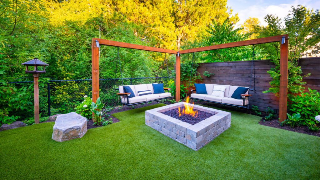 Backyard swings and fire pit Blessing Landscapes